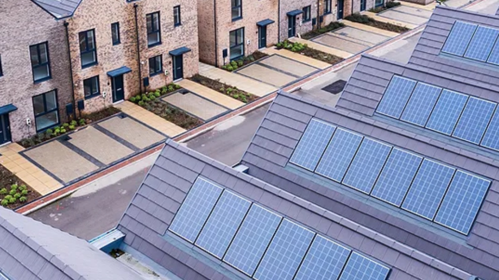 Rows of new-build homes in Preston with in-roof solar arrays