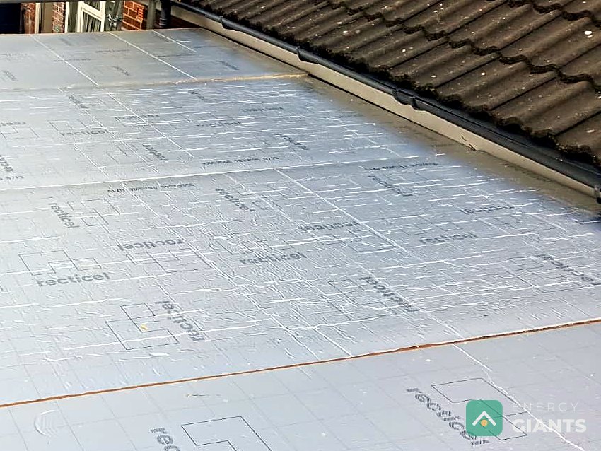 Recticel PIR insulation boards laid across a flat roof in Litherland