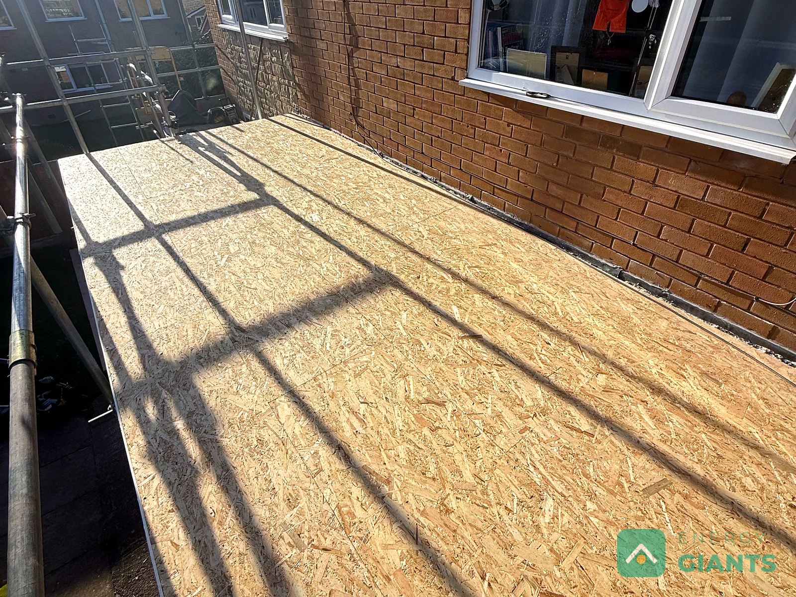A new OSB deck fixed over the insulation on a flat roof in Ruthin