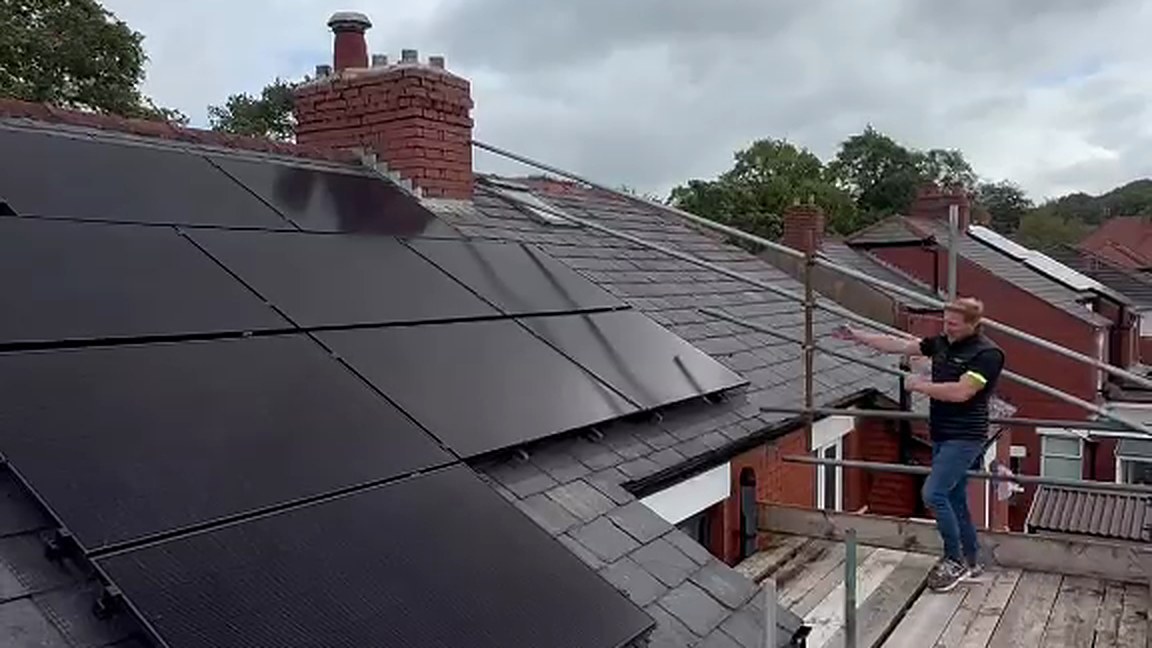 Nine all black Aiko panels on a slate rear roof in Wilpshire